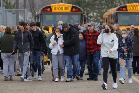 Prosecutor uses texts to try to show mom of school shooter cared more about horses than son