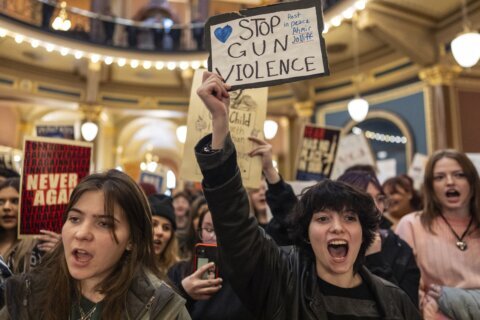 Students rally at the Iowa Capitol days after Perry school shooting