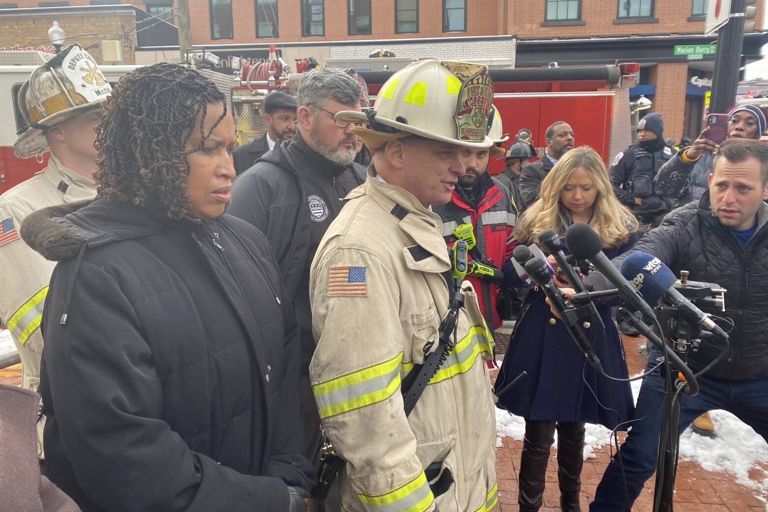 D.C. Mayor Muriel Bowser and Fire Chief John Donnelly brief reporters following the building explosion. (WTOP/John Domen)