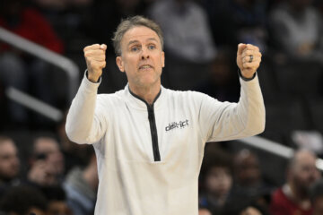 Washington Wizards interim coach Brian Keefe gestures during the first half of the team's NBA basketball game against the Cleveland Cavaliers, Wednesday, Feb 7, 2024, in Washington. (AP Photo/Nick Wass)