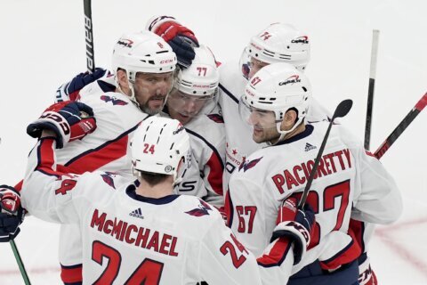 Oshie scores as Caps end skid with 3-0 win over Bruins; Ovechkin gets empty netter to pass Gretzky