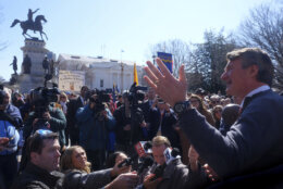 Virginia's Republican Gov. Glenn Youngkin talks to the media before walking with demonstrators during an anti-abortion demonstration at the March for Life event, Wednesday, Feb. 21, 2024, in Richmond, Va. (AP Photo/Jay Paul)