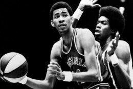Larry Kenon of the New York Nets, right, stays close to George Gervin of the Virginia Squires Friday, Dec. 22, 1973 at Nassau Coliseum in Uniondale, N. Y. The Nets won the American Basketball Association game 115-100. (AP Photo/Ray Stubblebine)
