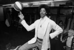 Julius Erving, star forward for the New York Nets, poses prior to a game against the Virginia Squires in Uniondale, NY, on April 8, 1974. Erving, 24, was named the American Basketball Association's Most Valuable Player this season. (AP Photo)