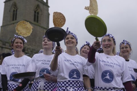 In this centuries-old English pancake race, ‘you just have to go flat out’