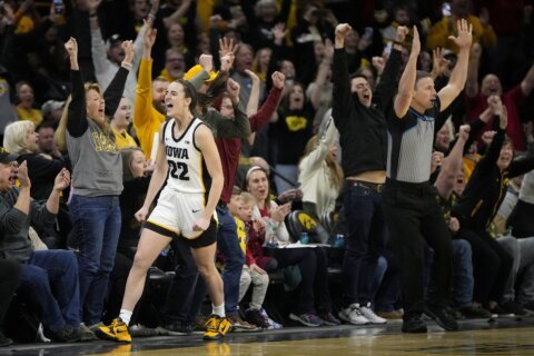 Caitlin Clark's 33-point game moves her past Lynette Woodard for the major college scoring record