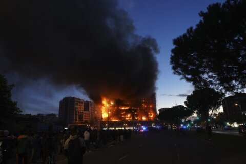 Fire engulfs 2 buildings in Spanish city of Valencia, killing at least 4 people. Nearly 20 missing