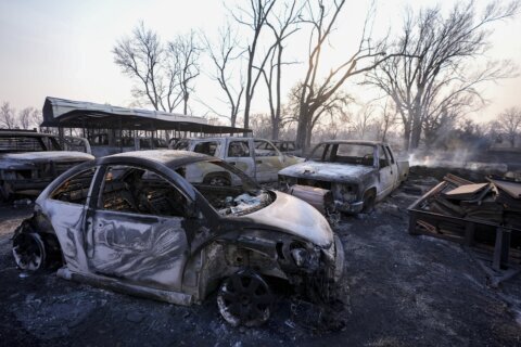 Texas battles historic wildfires as snow covers scorched land in the Panhandle