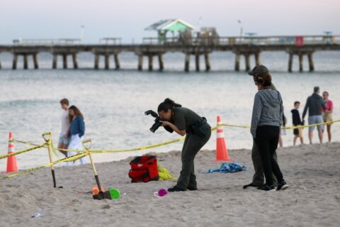Young girl killed when a hole she dug in the sand collapsed on a Florida beach, authorities said