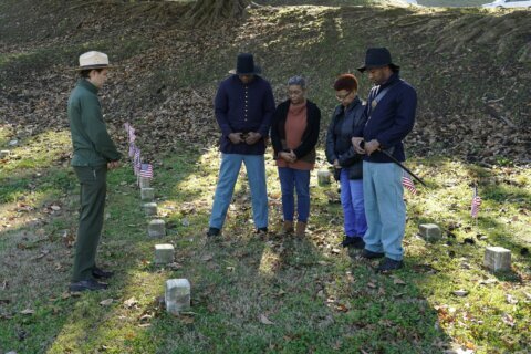 Black soldiers are honored, name by name, at a Civil War battlefield