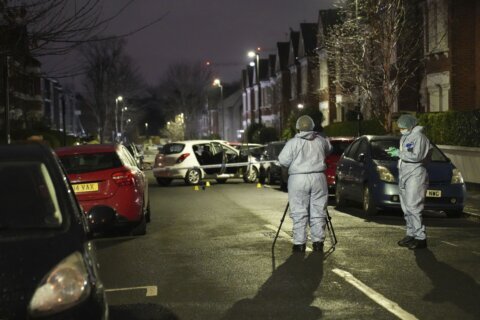 UK police hunt for a man suspected of throwing a 'corrosive substance' that injured 9 in London