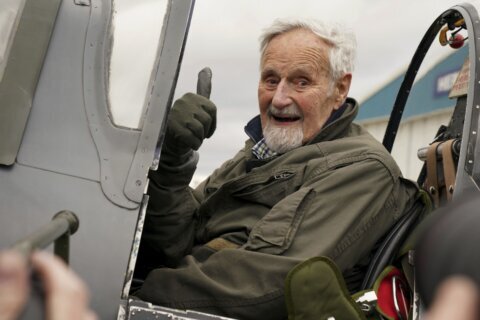102-year-old British veteran flies a Spitfire on a delightfully bumpy ride for charity