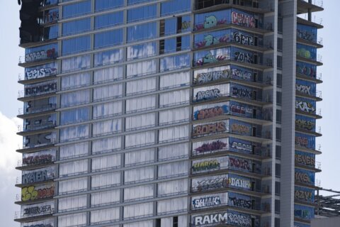 Towering over the Grammys is a Los Angeles high-rise tagged with 27 stories of graffiti