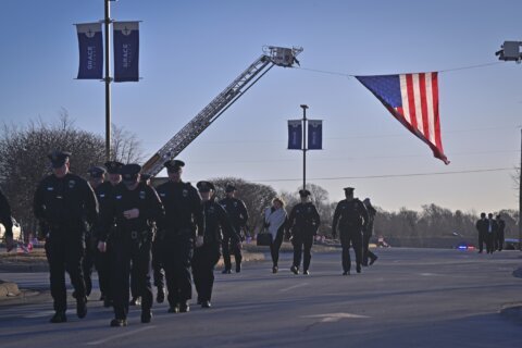 Three slain Minnesota first responders are honored as heroes who made the ultimate sacrifice