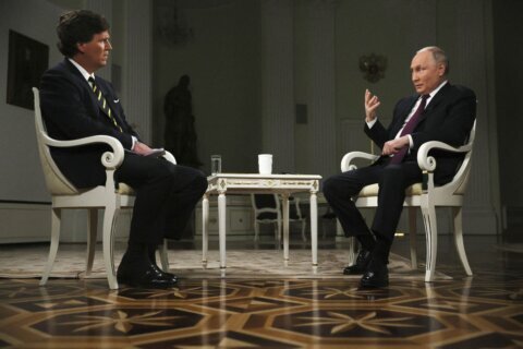 Putin uses Tucker Carlson interview to press his Ukraine narrative, hints at swapping WSJ reporter