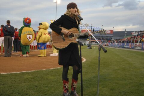 Taylor Swift’s connections to sports go back to her early days performing the national anthem