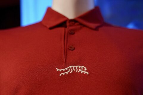 Tiger Woods unveils Sun Day Red, a new apparel brand with TaylorMade. Here's what it means