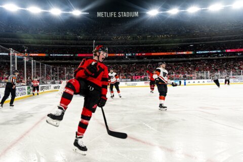 Nico Hischier scores twice as Devils beat Flyers 6-3 before 70,328 at MetLife Stadium