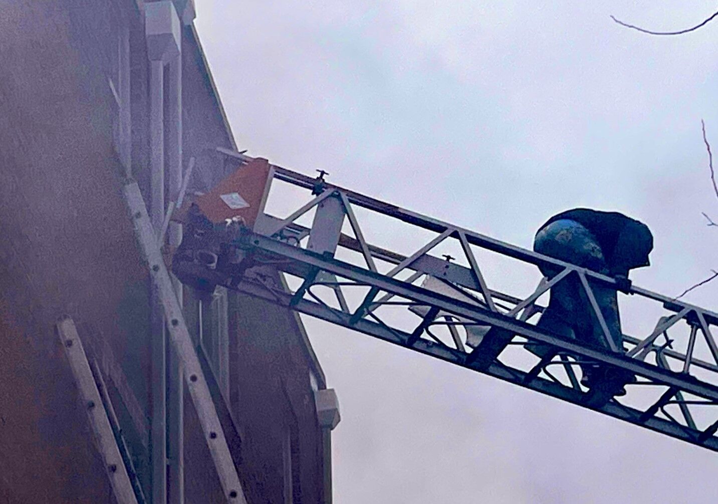 person on fire ladder