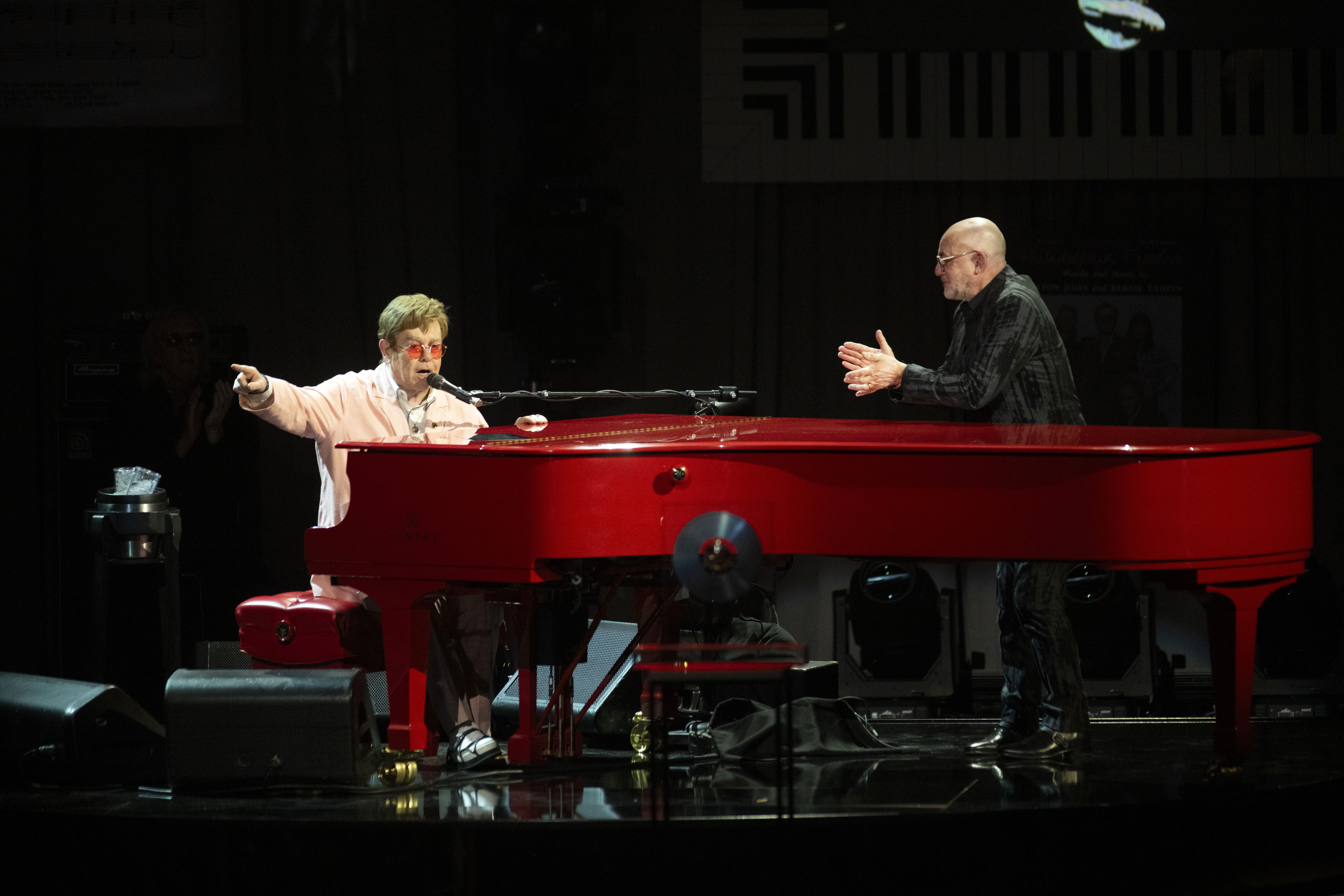Elton John, left, and Bernie Taupin perform during the 2024 Library of Congress Gershwin Prize for Popular Song tribute concert honoring the pair at DAR Constitution Hall on Wednesday, March 20, 2024, in Washington. (AP Photo/Kevin Wolf)