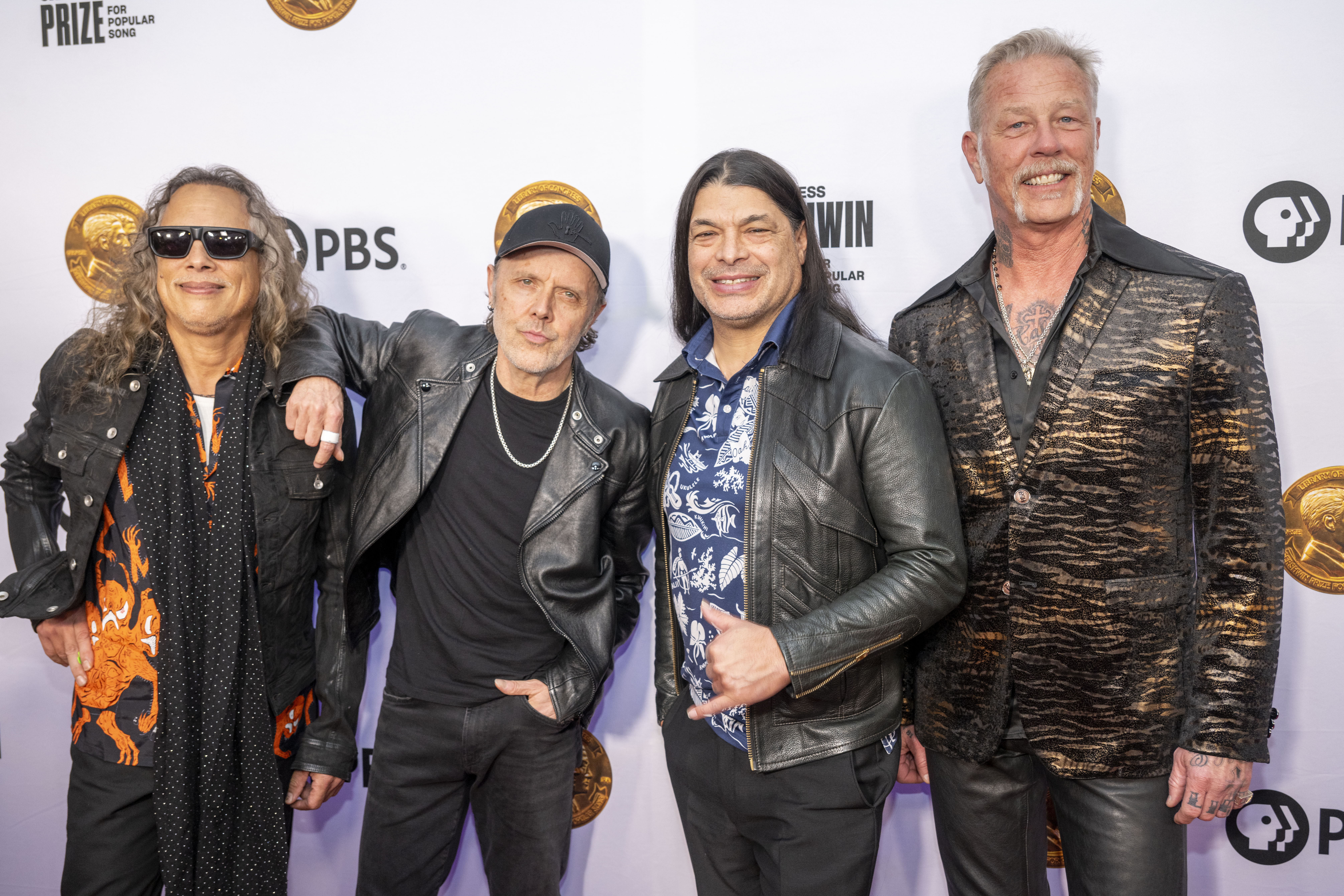 From left, members of Metallica, Kirk Hammett, Lars Ulrich, Robert Trujillo, and James Hetfield arrive on the red carpet for the 2024 Library of Congress Gershwin Prize for Popular Song honoring Elton John and Bernie Taupin at DAR Constitution Hall on Wednesday, March 20, 2024, in Washington. (AP Photo/Kevin Wolf)