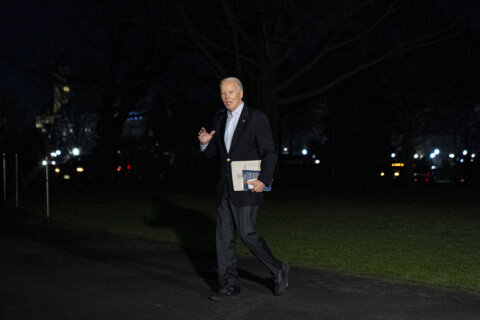 President Joe Biden signs short-term spending bill to avoid partial government shutdown