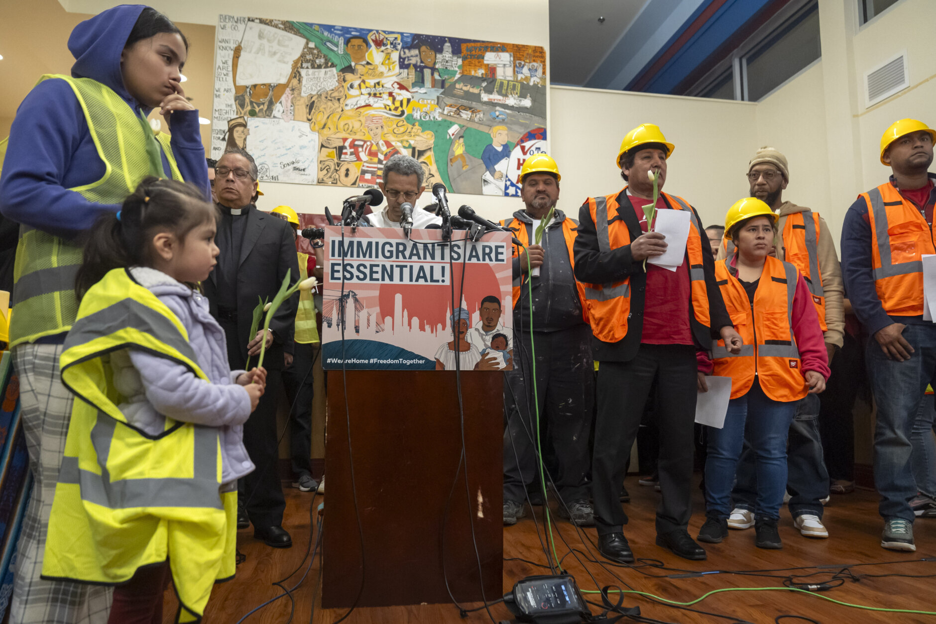 Construction workers and supporters gather during a vigil and press conference by CASA of Maryland, a community advocacy group, to remember the six workers killed in the collapse of the Francis Scott Key Bridge and to highlight the difficult conditions faced by immigrant construction workers on Friday, March 29, 2024, in Baltimore, Md. (AP Photo/Mark Schiefelbein)