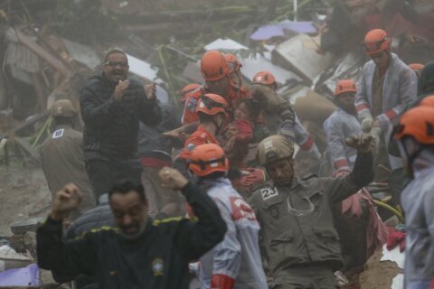 Heavy rains kill at least 7 in Rio de Janeiro state, 4-year-old rescued after 16 hours under mud