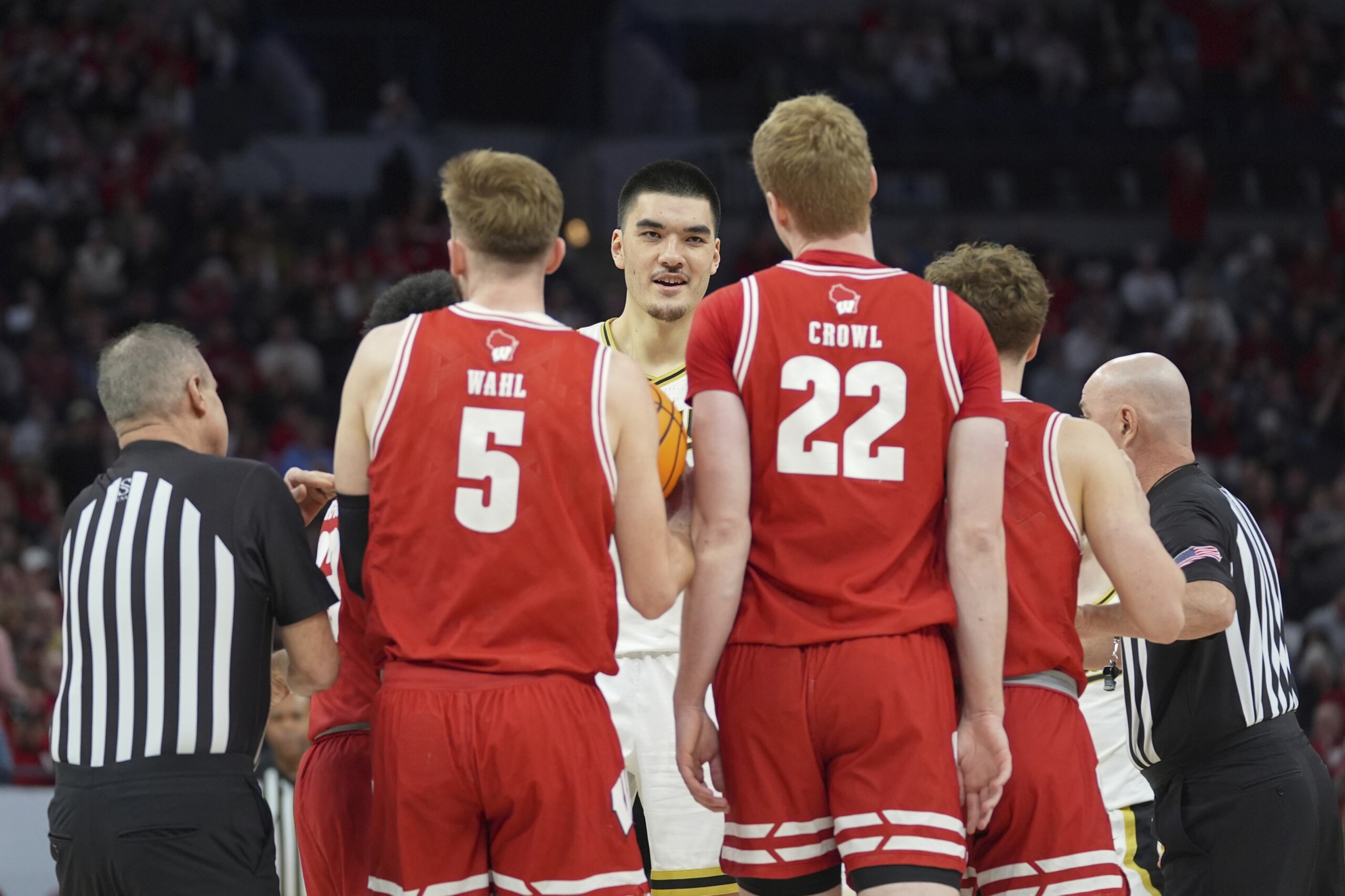 Wisconsin battles to 76-75 OT win over No. 3 Purdue, securing spot in