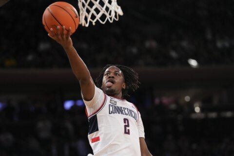 Newton leads No. 2 UConn past St. John’s 95-90 and into first Big East title game since 2011