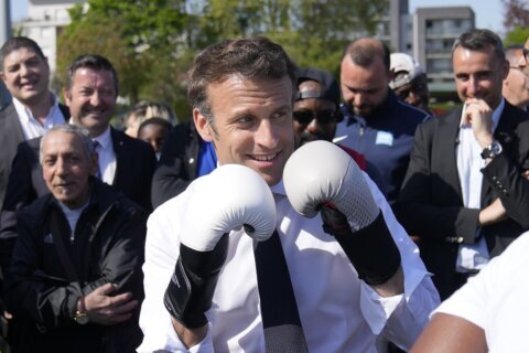 France’s president pounds a punching bag on camera, and Europe notices