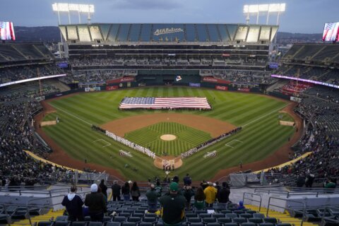 Oakland Athletics fans boycott home opener outside stadium in protest of Las Vegas move