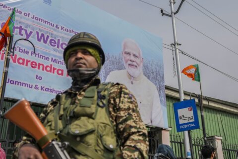 Modi visits Kashmir's main city for the first time since revoking region's semi-autonomy