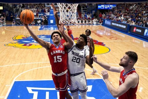 Kansas guard Kevin McCullar Jr. ruled out of NCAA Tournament with bone bruise on knee