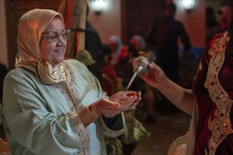 The scent of orange blossoms is bringing the world to a spring tradition in Morocco