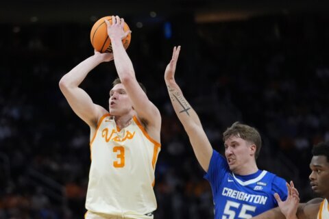 Dalton Knecht scores 24, Tennessee beats Creighton 82-75 to pull within a win of first Final Four