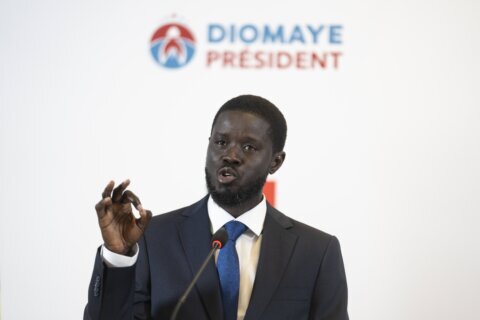 Senegal swears in Africa’s youngest elected leader as president in a dramatic prison-to-palace rise