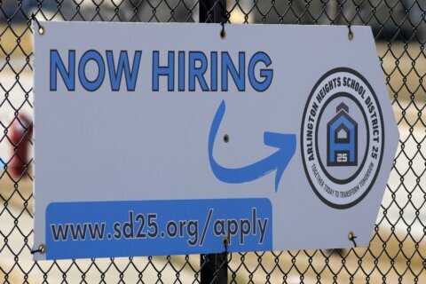 Applications for U.S. unemployment benefits dip to 210,000, another sign the job market is strong