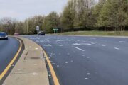 Strange sight: Fake money flies around Maryland highway