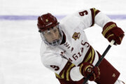 Boston College forward Ryan Leonard (9) takes a shot before the start of an NCAA hockey game against Michigan Tech on Friday, March 29, 2024, in Providence, R.I. (AP Photo/Greg M. Cooper)