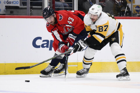 New faces help the Penguins beat the Capitals 4-1 and move closer to a playoff spot