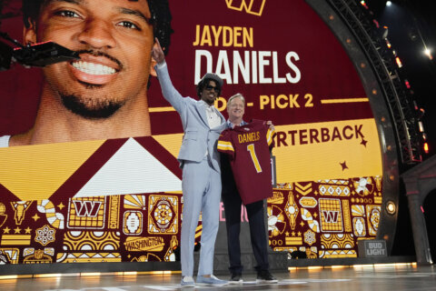 Commanders select Heisman Trophy-winning LSU QB Jayden Daniels with the 2nd pick in the NFL draft
