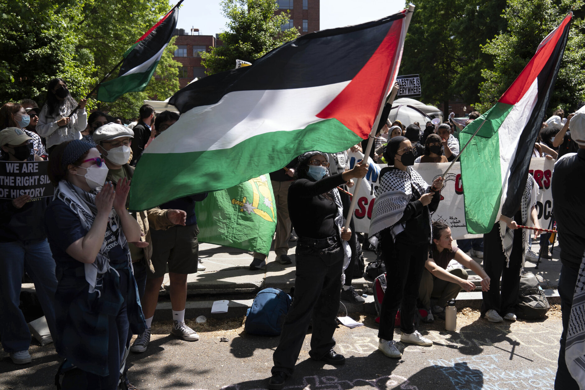 George Washington University students demonstrate on the street after police close the student plaza during a pro-Palestinian protest over the Israel-Hamas war on Friday, April 26, 2024, in Washington. (AP Photo/Jose Luis Magana)