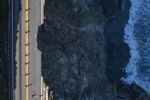 Motorists creep along 1 lane after part of California's iconic Highway 1 collapses