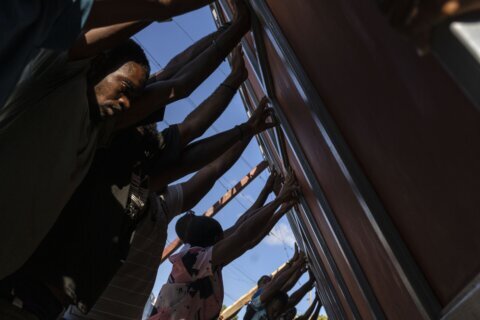 Haitians scramble to survive, seeking food, water and safety as gang violence chokes the capital