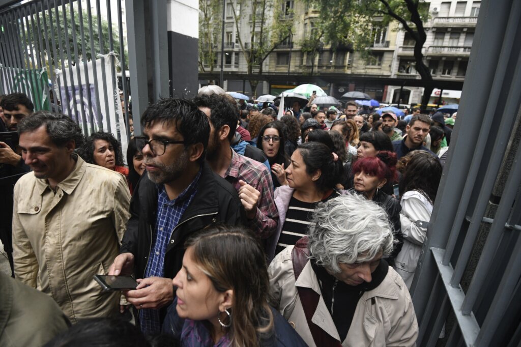 Argentina’s Milei takes his chainsaw to the state, cutting 15,000 jobs and spurring protests