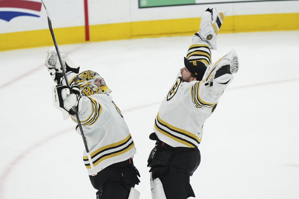 Marchand breaks team playoff goals mark, Bruins beat Maple Leafs 3-1 to move within win of advancing