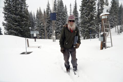 Citizen scientist measured Rockies snowfall for 50 years. Two new hips help him keep going