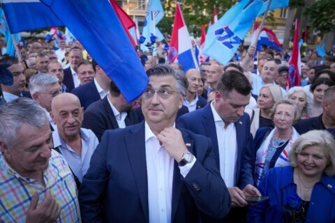 Croatia's ruling conservatives win parliamentary vote, but cannot rule alone