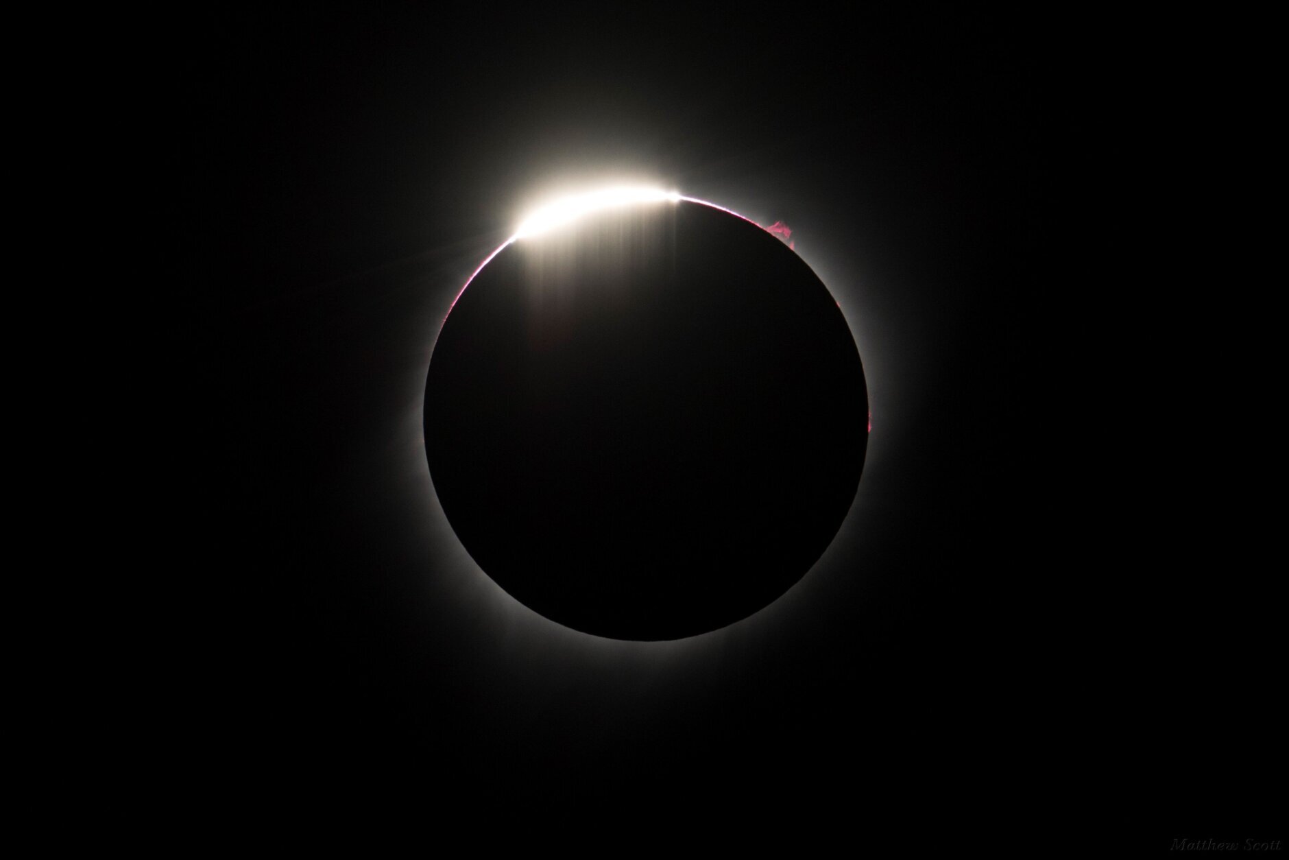 The red rim around a total eclipse.